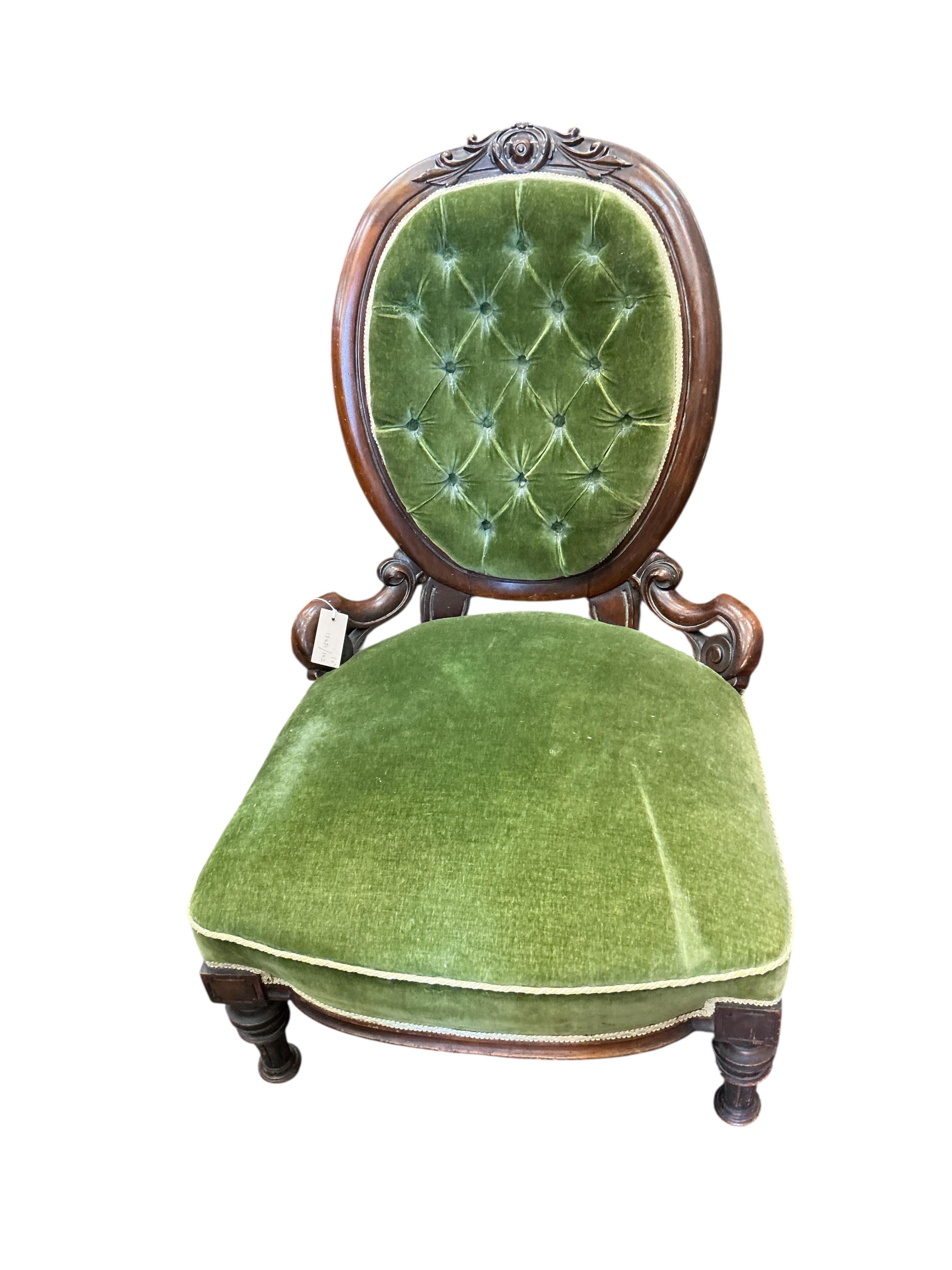 A Victorian upholstered mahogany nursing chair together with a Victorian prie dieu chair